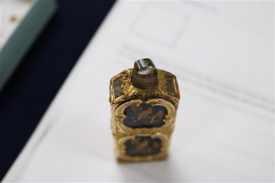 An early 20th century continental gold overlaid enamelled glass scent bottle, 75mm.